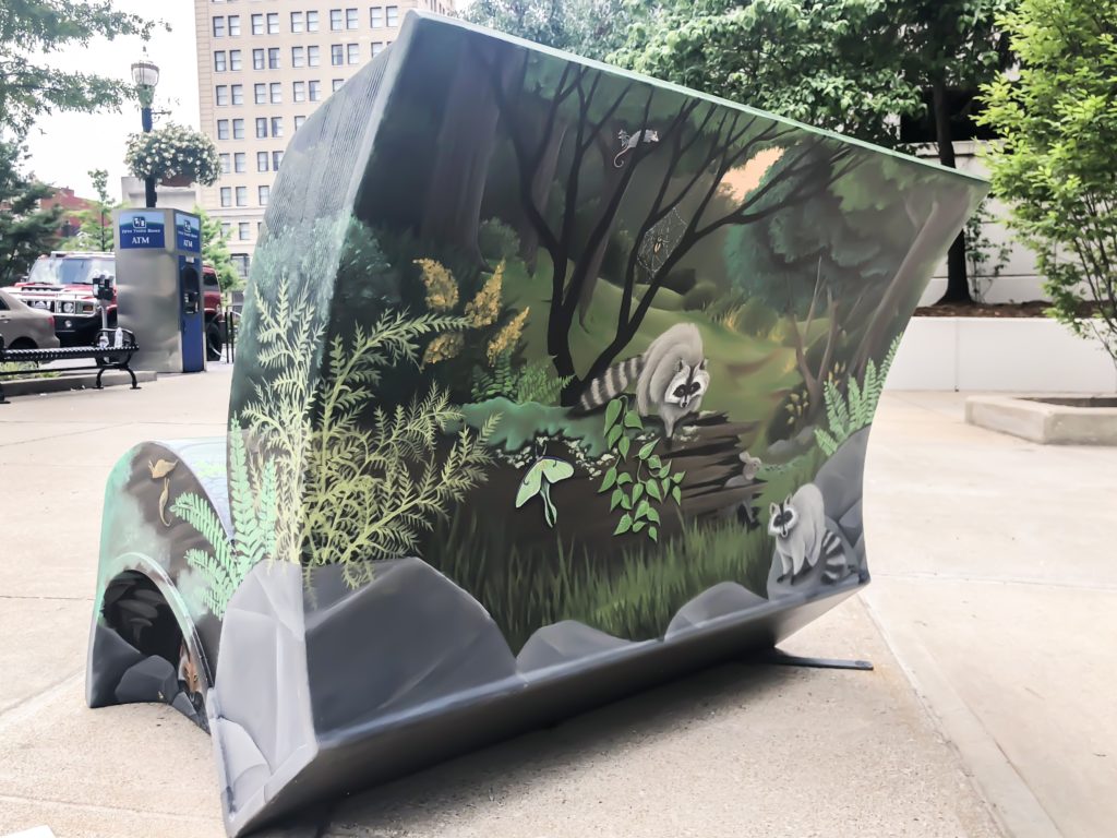 In the summer of 2018, Arts Connect, LexArts and The Carnegie Center for Literacy and Learning has made Lexington more colorful with their collaborative project, Book Benches.​ Book Benches are thirty five book-shaped functional benches that are placed throughout downtown Lexington to celebrate Kentucky's literary heritage, to encourage reading, and provide a place for rest. Each bench is illustrated and themed around different works by Kentucky authors and will remain on display for the duration of the summer. #sharethelex #art #painting #artist #author #book #lexingtonky #kentucky #visitlex #bench