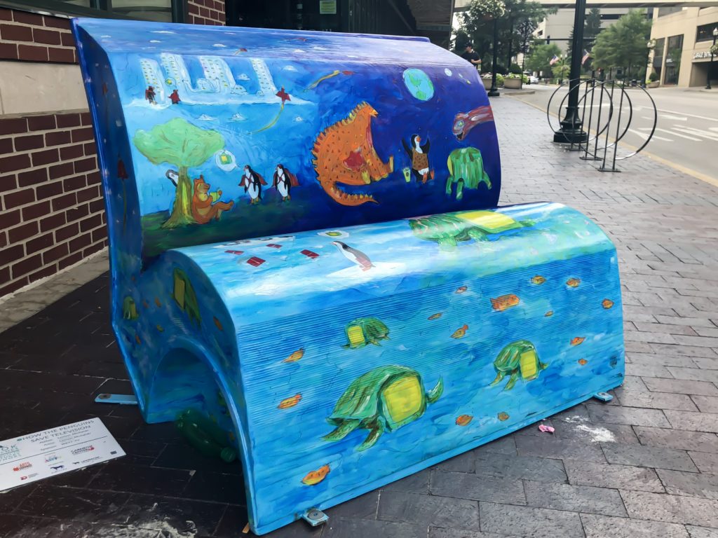 In the summer of 2018, Arts Connect, LexArts and The Carnegie Center for Literacy and Learning has made Lexington more colorful with their collaborative project, Book Benches.​ Book Benches are thirty five book-shaped functional benches that are placed throughout downtown Lexington to celebrate Kentucky's literary heritage, to encourage reading, and provide a place for rest. Each bench is illustrated and themed around different works by Kentucky authors and will remain on display for the duration of the summer. #sharethelex #art #painting #artist #author #book #lexingtonky #kentucky #visitlex #bench