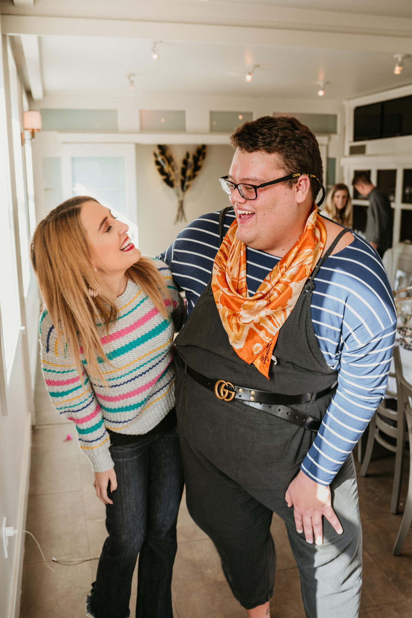 Girl and guy hugging and laughing