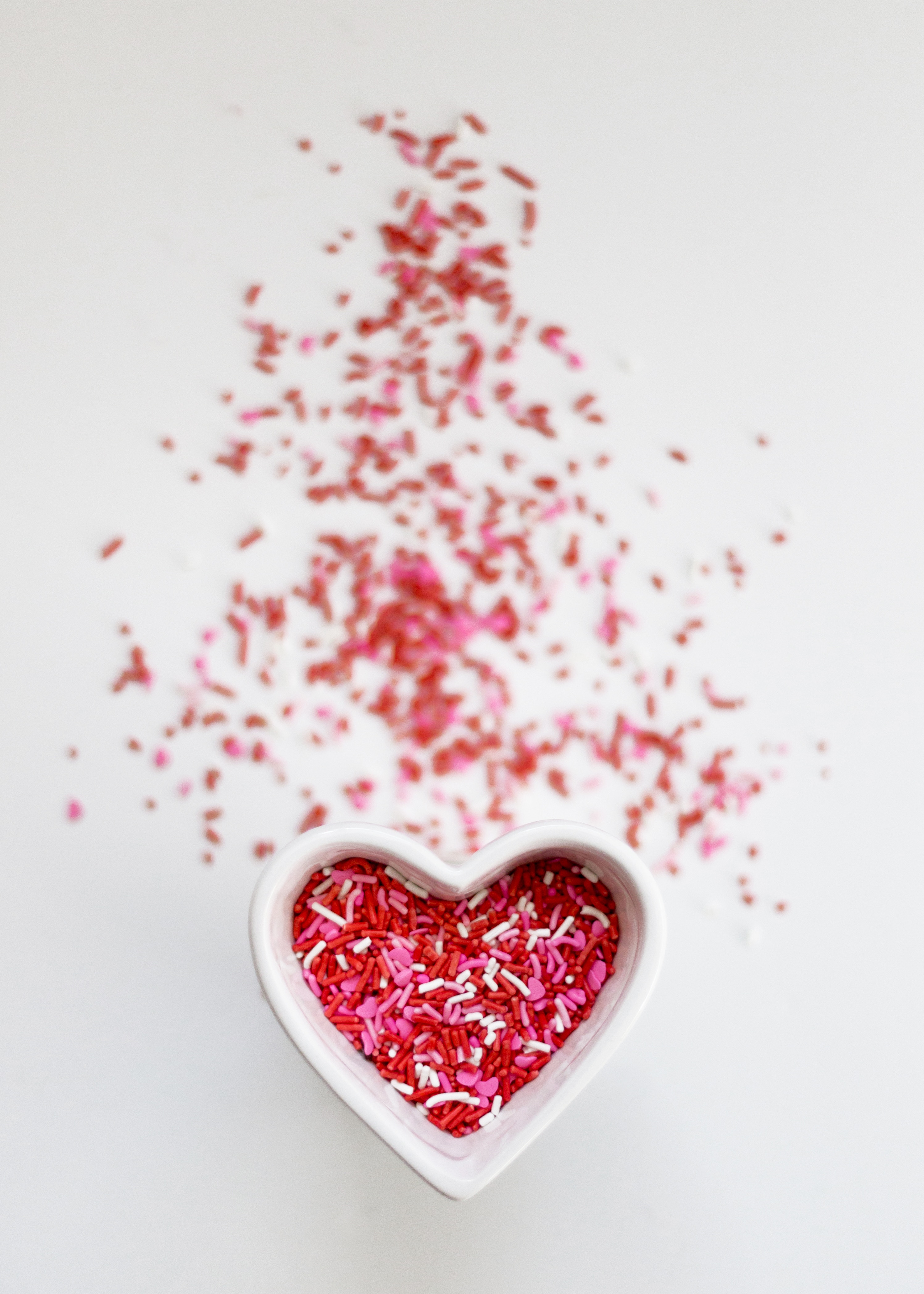 Heart shaped dish with red sprinkles for Valentine's Day