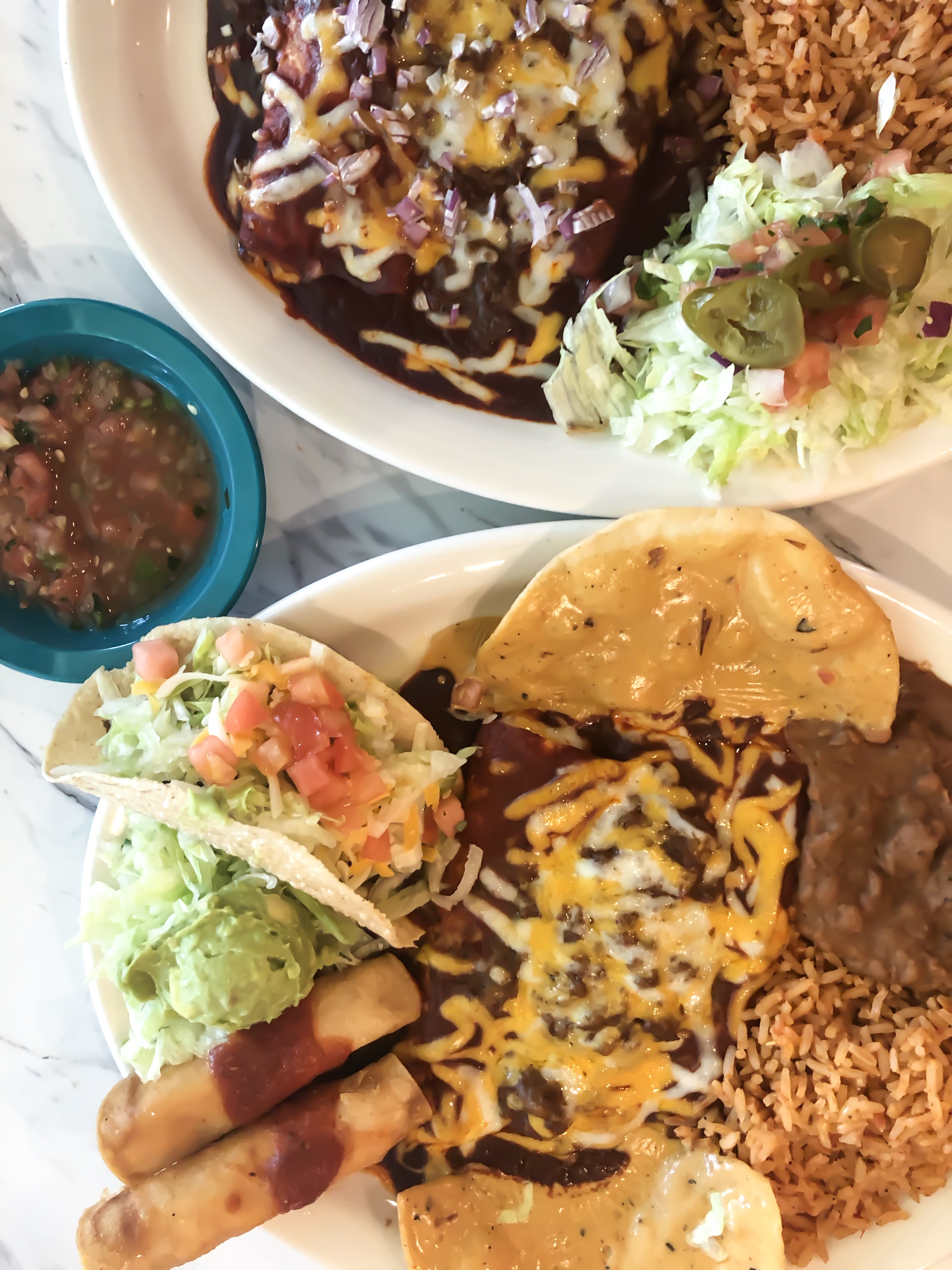 mexican food on a plate from chuy's