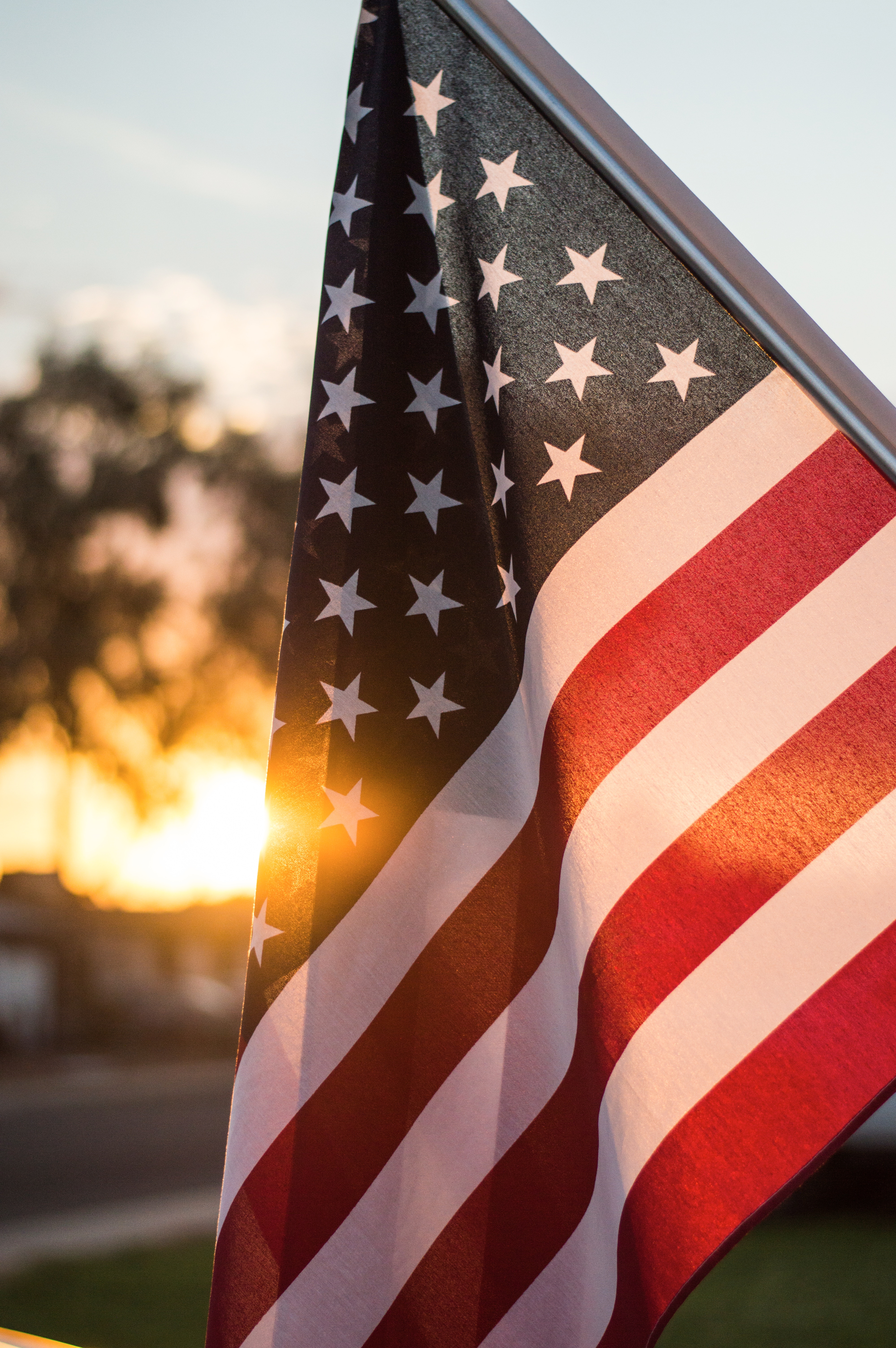 American Flag with a sunset