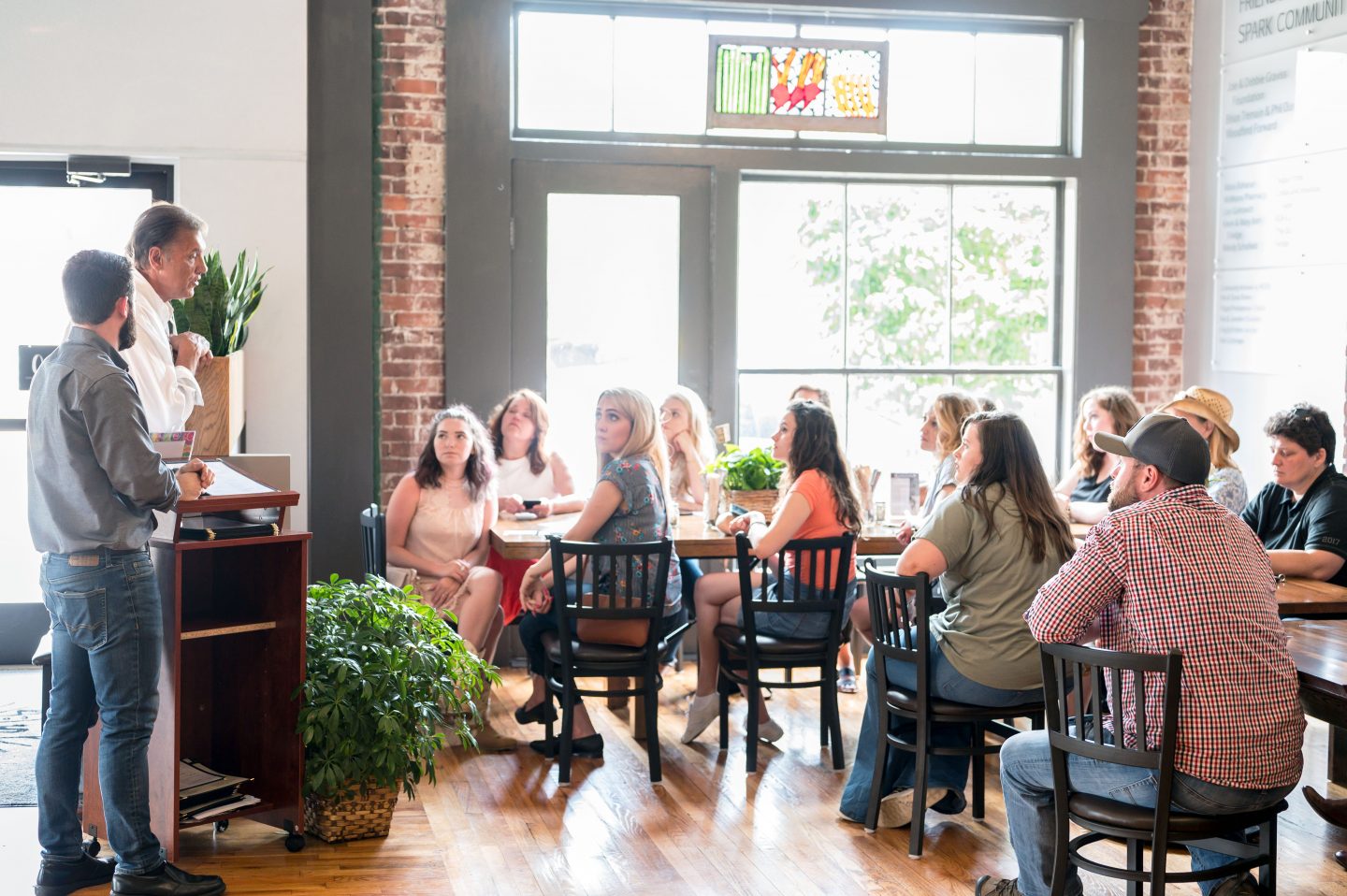 a group of people inside of a restaurant