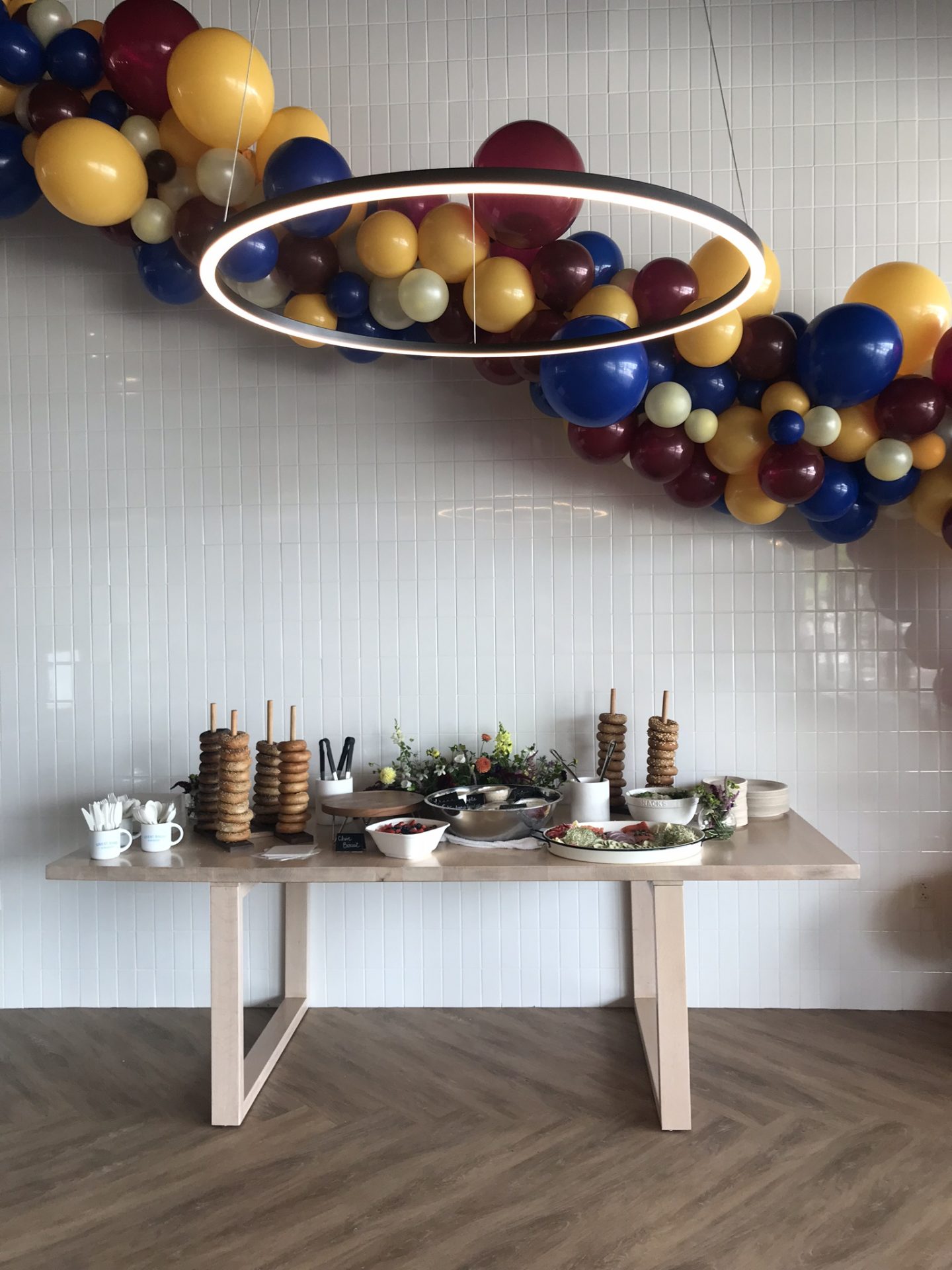 A table of bagels and food