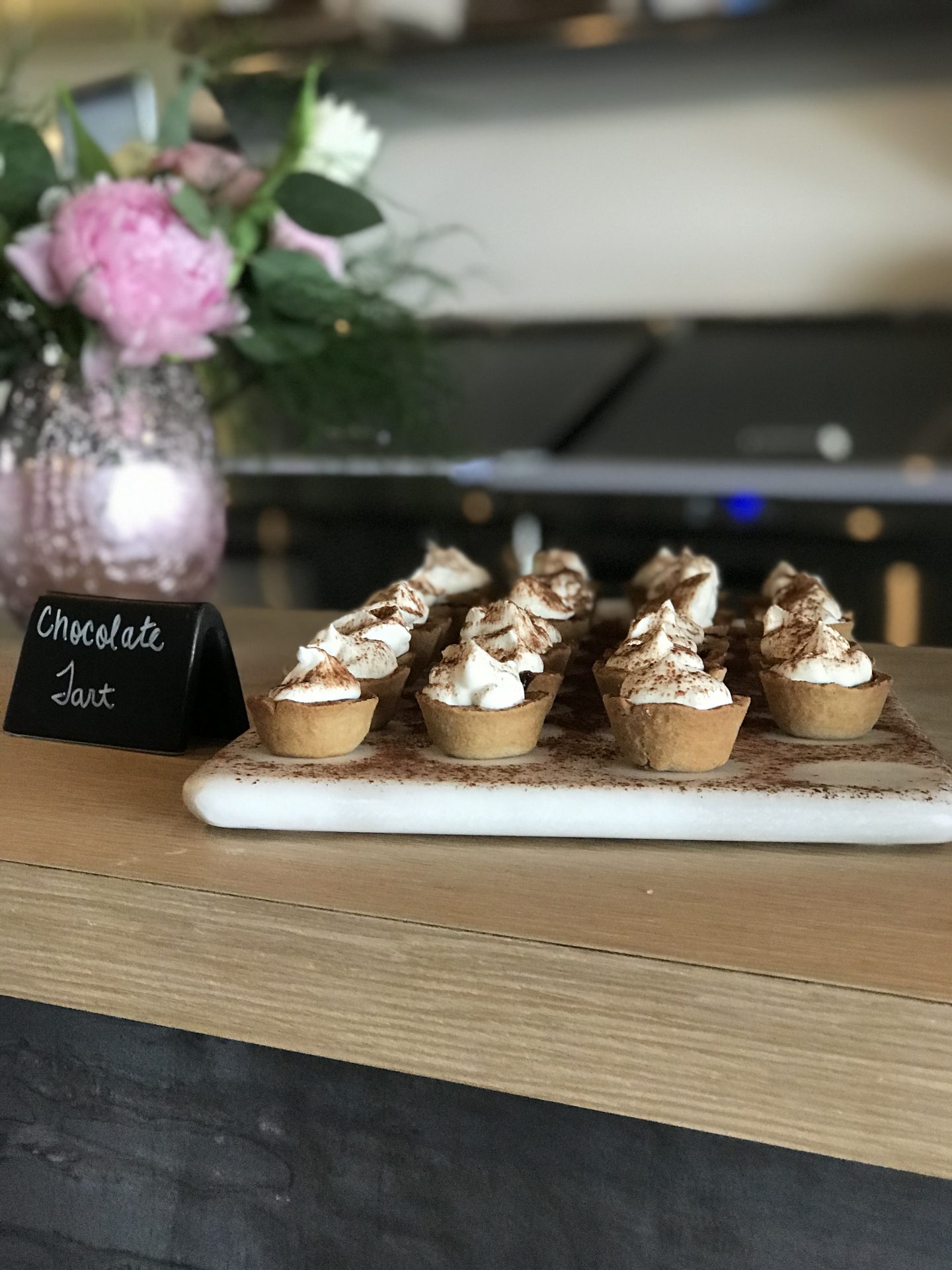 Desserts on a wooden counter