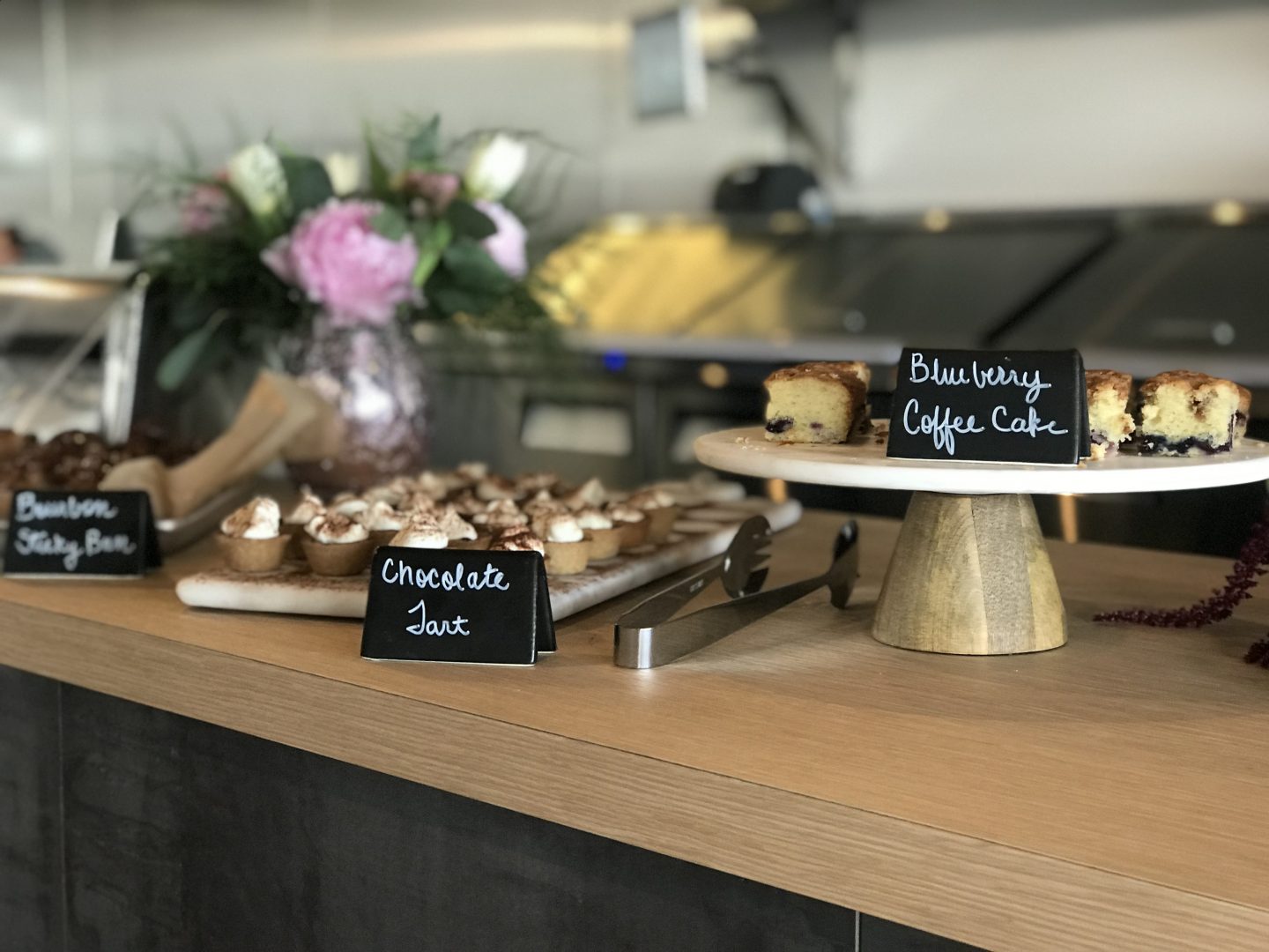 Desserts on a wooden counter