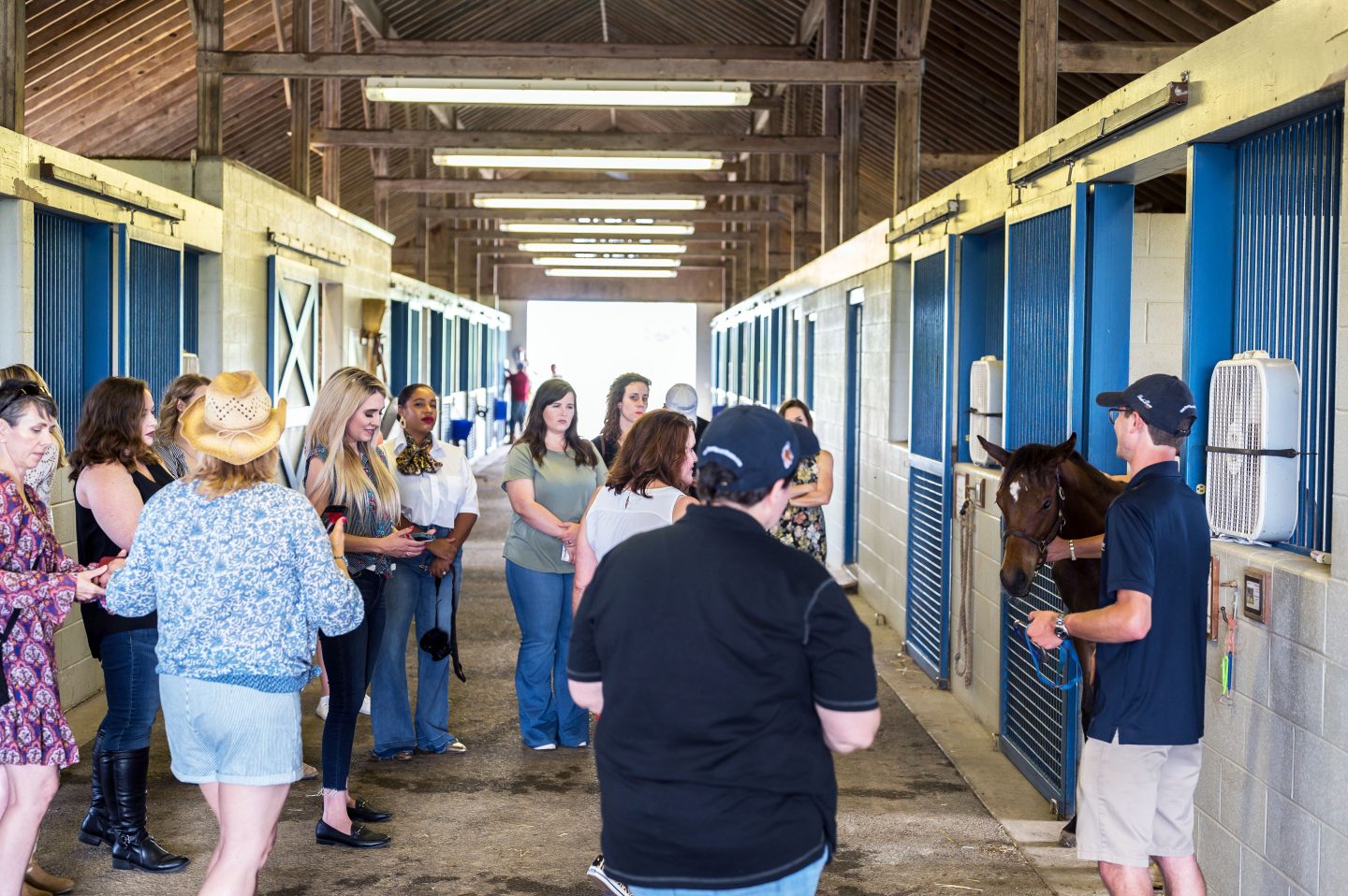 Women inside of a barn