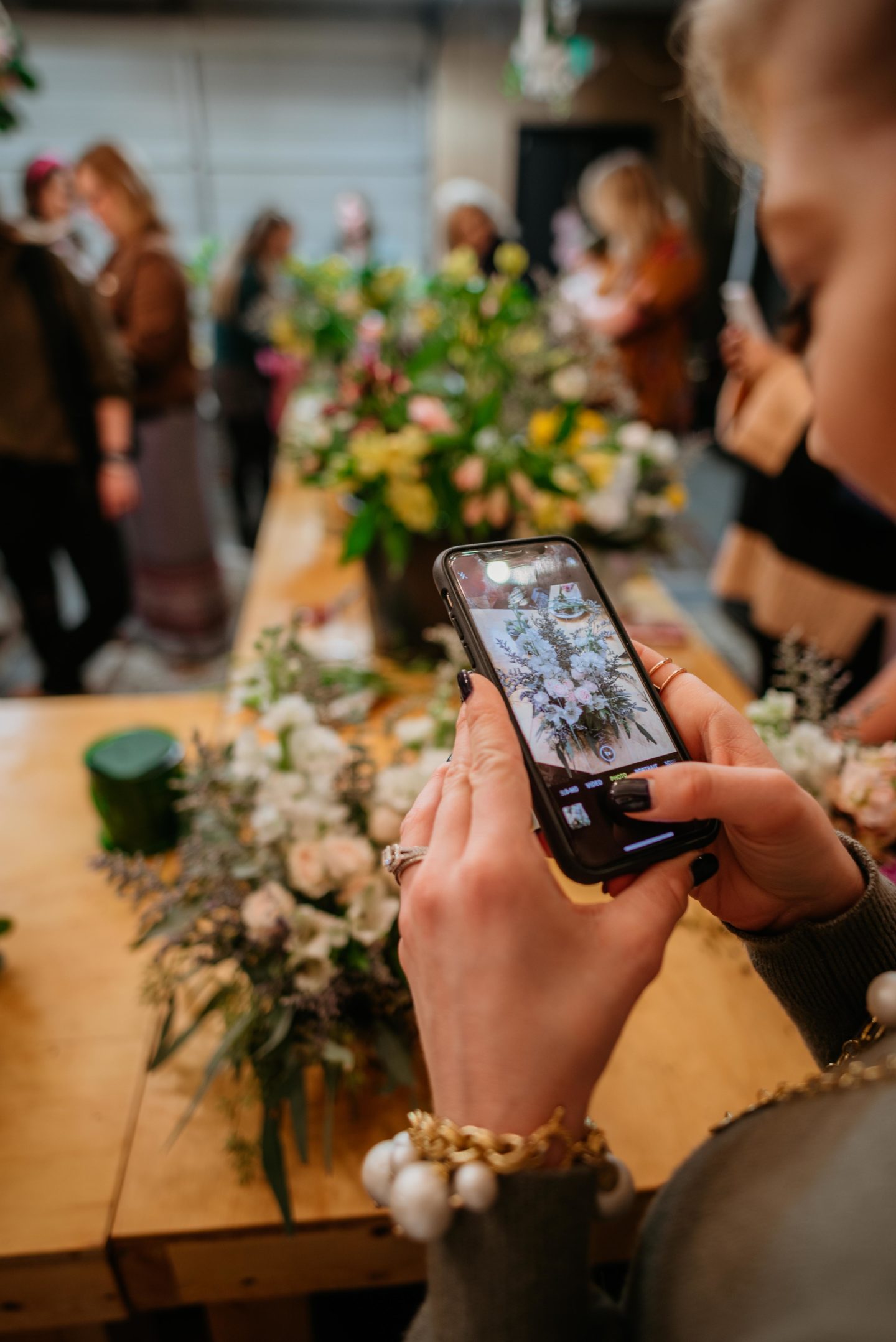 taking a photo of flowers